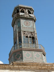 Башня с часами из ажурной меди